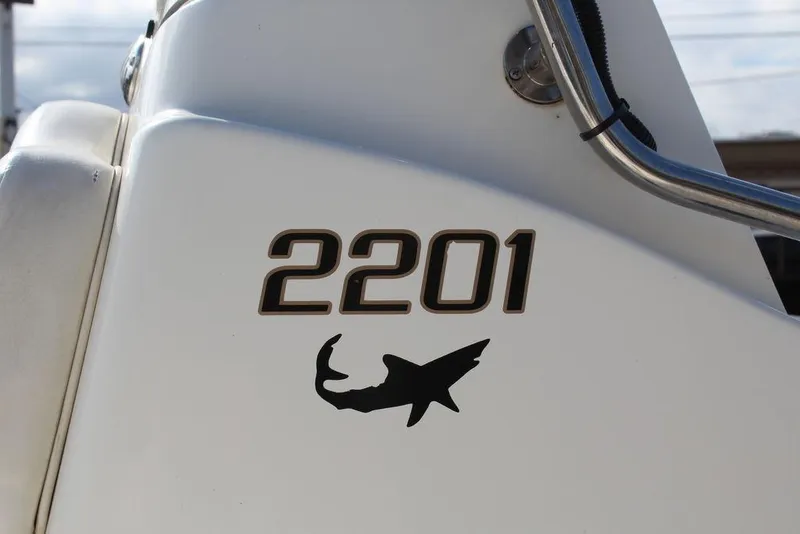 Slide: The Image of Kenner 2201 boat, 2009 model, featuring shark silhouette on white surface. - 20