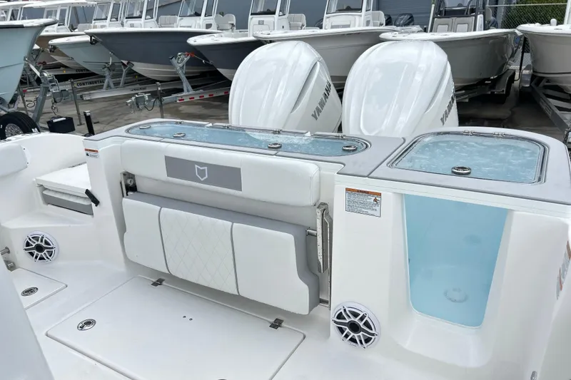 Slide: The Image of 2026 Sea Fox 328 Commander boat with Yamaha engines and spacious deck layout. - 12