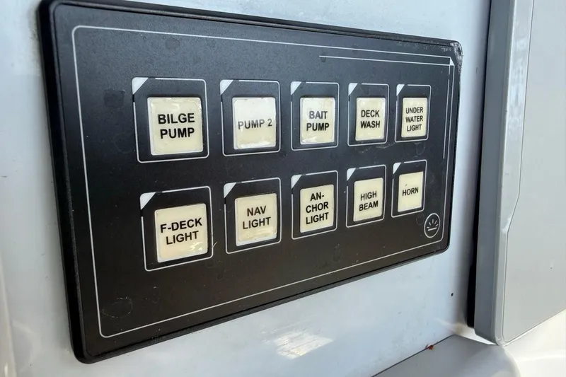 Slide: The Image of Control panel of Xplor X24 boat, featuring various function buttons, 2024 model. - 22