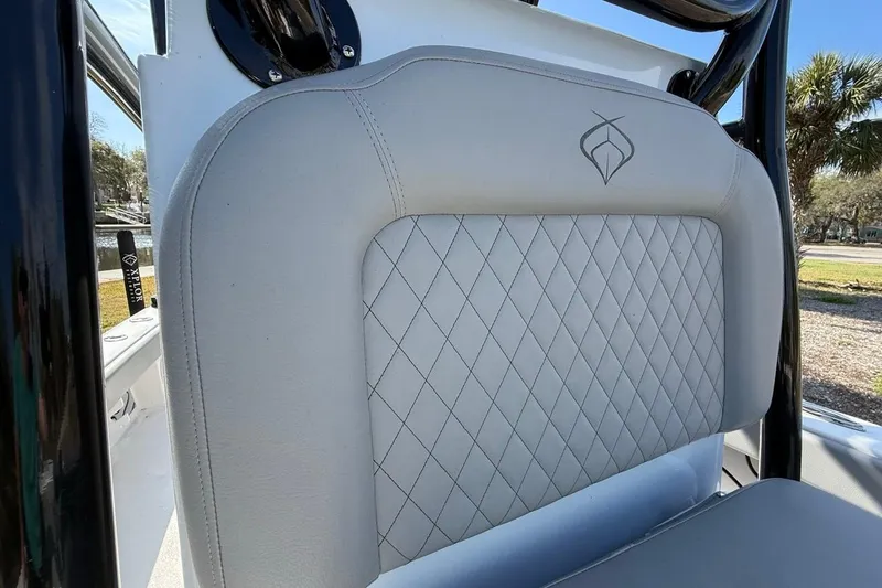 Slide: The Image of 2024 Xplor X24 boat seat with diamond stitching and logo detail. - 33