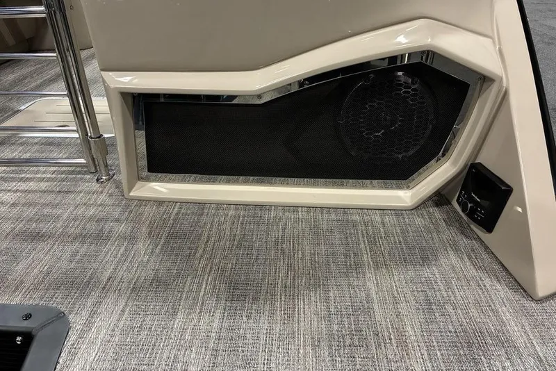 Slide: The Image of 2026 Bennington 25 RXFBA interior speaker and control panel on textured flooring. - 7