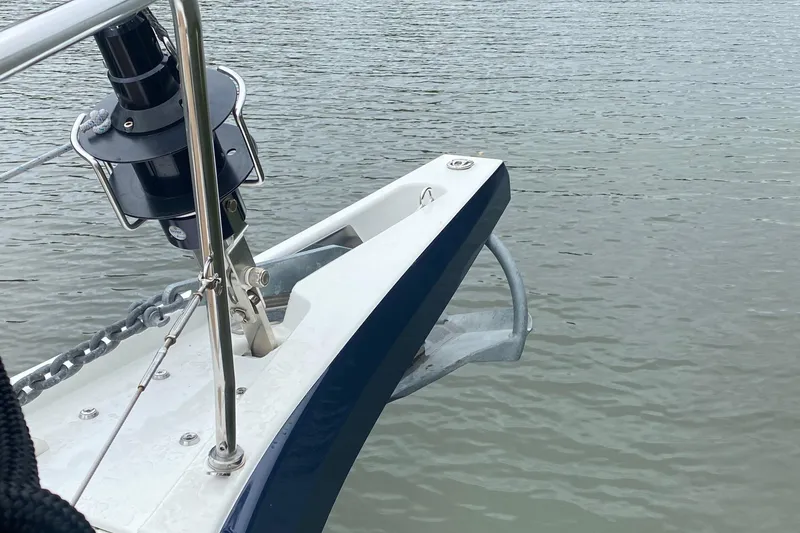 Slide: The Image of Bow of 2019 Beneteau Oceanis 51.1 sailboat with anchor and calm water. - 19