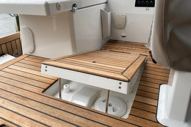 Slide: The Image of Teak deck of 2019 Beneteau Oceanis 51.1 sailboat, featuring elegant wood finish. - 21