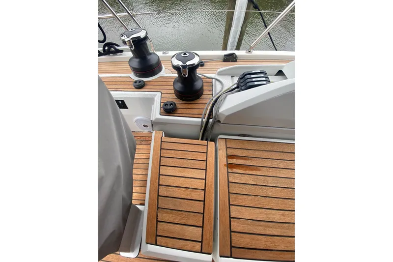 Slide: The Image of Teak deck and winches on 2019 Beneteau Oceanis 51.1 sailboat. - 23