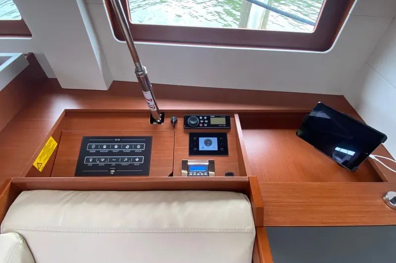 Slide: The Image of Interior control panel of 2019 Beneteau Oceanis 51.1 yacht with navigation equipment. - 31