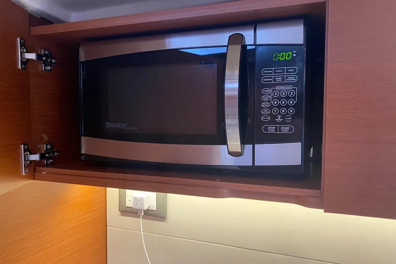 Slide: The Image of Microwave in Beneteau Oceanis 51.1 yacht kitchen, 2019 model. - 33