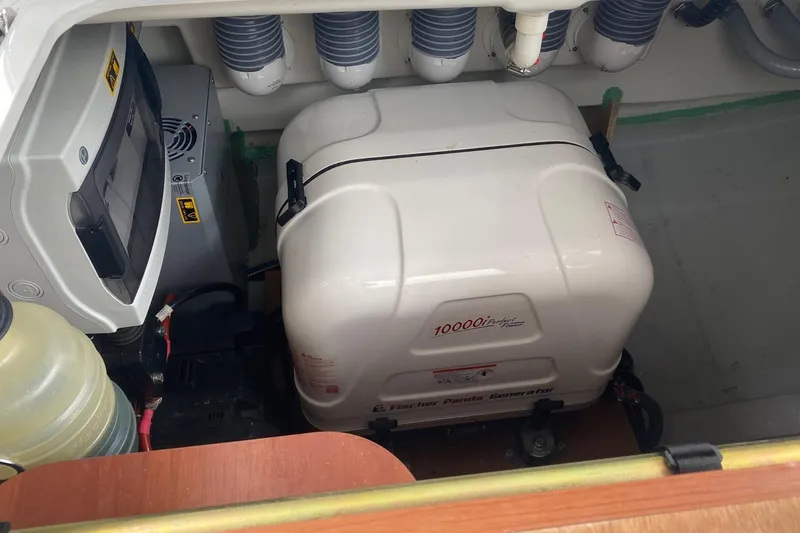 Slide: The Image of Engine room of 2019 Beneteau Oceanis 51.1 with Fischer Panda generator. - 46