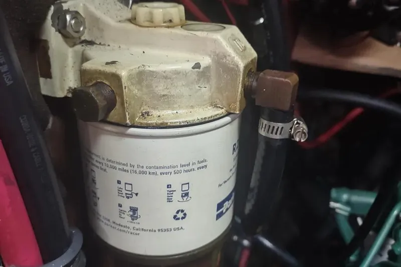 Slide: The Image of Fuel filter system in a 1990 Beneteau Oceanis 390 sailboat engine compartment. - 40
