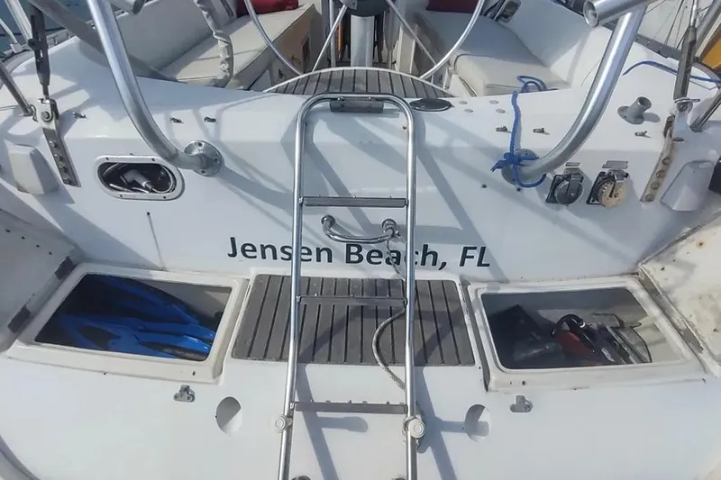 Slide: The Image of Beneteau Oceanis 390 sailboat deck with ladder, Jensen Beach, FL, 1990 model. - 50
