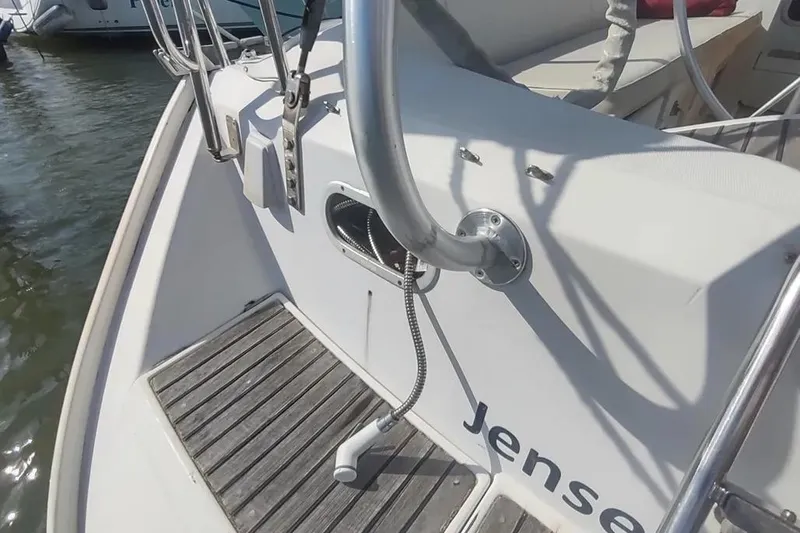 Slide: The Image of Beneteau Oceanis 390 yacht deck, 1990 model, featuring a clean, modern design. - 51