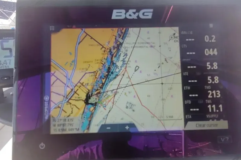 Slide: The Image of B&G navigation display on a 1990 Beneteau Oceanis 390 sailboat, showing nautical chart. - 54