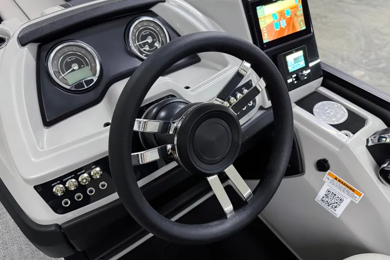 Slide: The Image of 2026 Barletta Cabrio 24UC dashboard with steering wheel, gauges, and touchscreen display. - 16