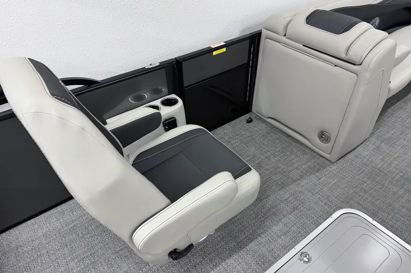 Slide: The Image of 2026 Barletta Cabrio 24UC interior seating with cup holders and modern design. - 17