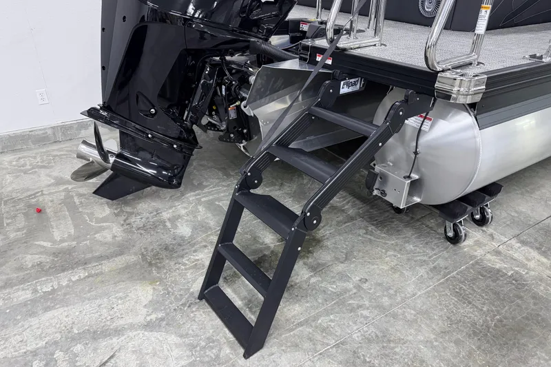 Slide: The Image of 2026 Barletta Cabrio 24UC pontoon boat with motor and boarding ladder. - 27