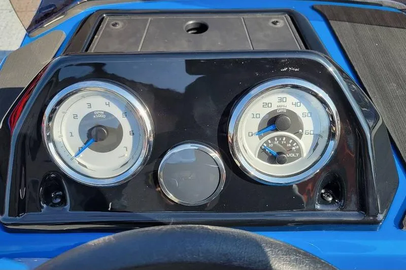 Slide: The Image of Dashboard of 2026 Smoker Craft Lazer 161 boat with RPM and speed gauges. - 17