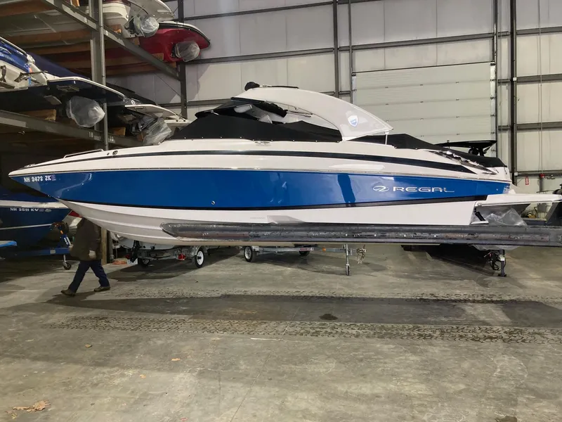 The Image of 2014 Regal 27 FasDeck boat in storage facility. - 0