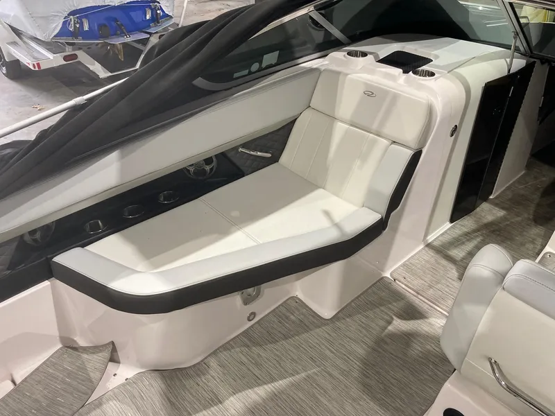 Slide: The Image of Interior of 2014 Regal 27 FasDeck with white seating area. - 3