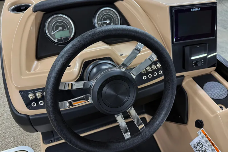 Slide: The Image of Steering console of 2026 Barletta Cabrio 24UC with modern controls and display. - 15