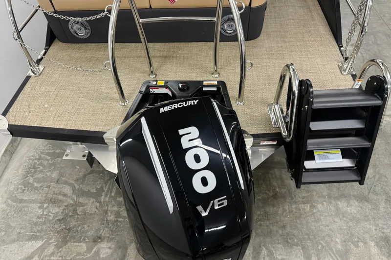 Slide: The Image of 2026 Barletta Cabrio 24UC with Mercury 200 V6 engine and swim ladder. - 3