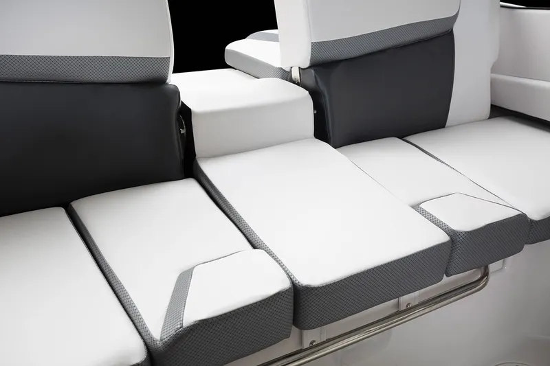 Slide: The Image of 2019 Scarab 195 G boat interior with white and black seating. - 11
