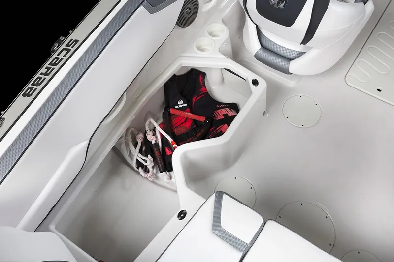 Slide: The Image of 2019 Scarab 195 G boat interior with cushioned seating in white and gray. - 15