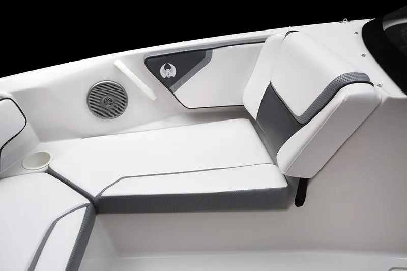 Slide: The Image of 2019 Scarab 195 G boat with black and white design in showroom. - 5
