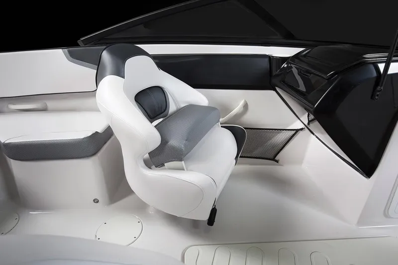 Slide: The Image of Steering wheel and dashboard of 2019 Scarab 195 G boat, featuring gauges and controls. - 8