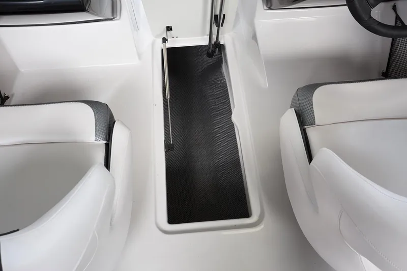 Slide: The Image of 2019 Scarab 195 G boat dashboard with steering wheel and instrument panel. - 9