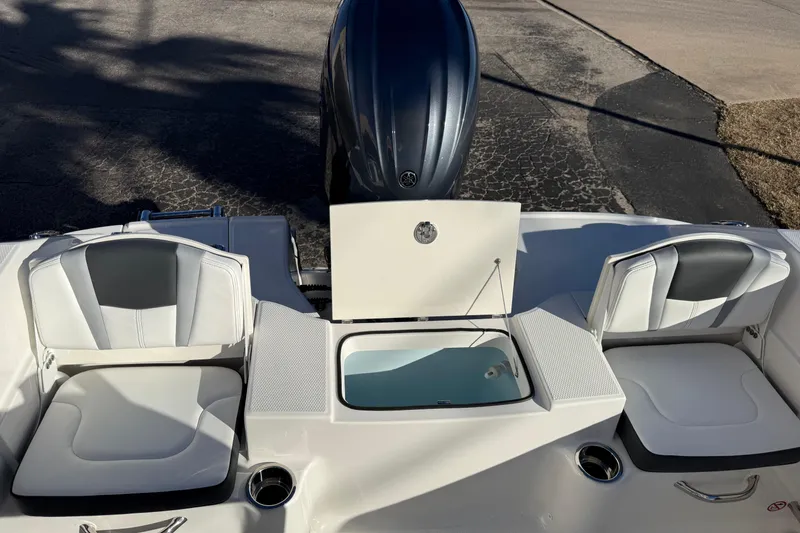 Slide: The Image of 2026 Robalo R200 Center Console boat interior with seating and storage compartments. - 10