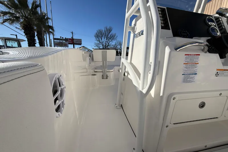 Slide: The Image of 2026 Robalo R200 Center Console boat interior with sleek design and modern controls. - 26