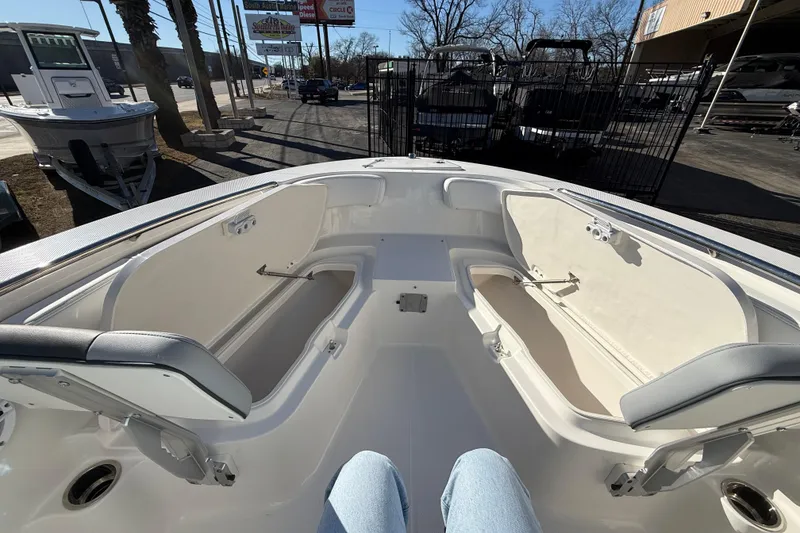 Slide: The Image of 2026 Robalo R200 Center Console boat interior with open storage compartments. - 31