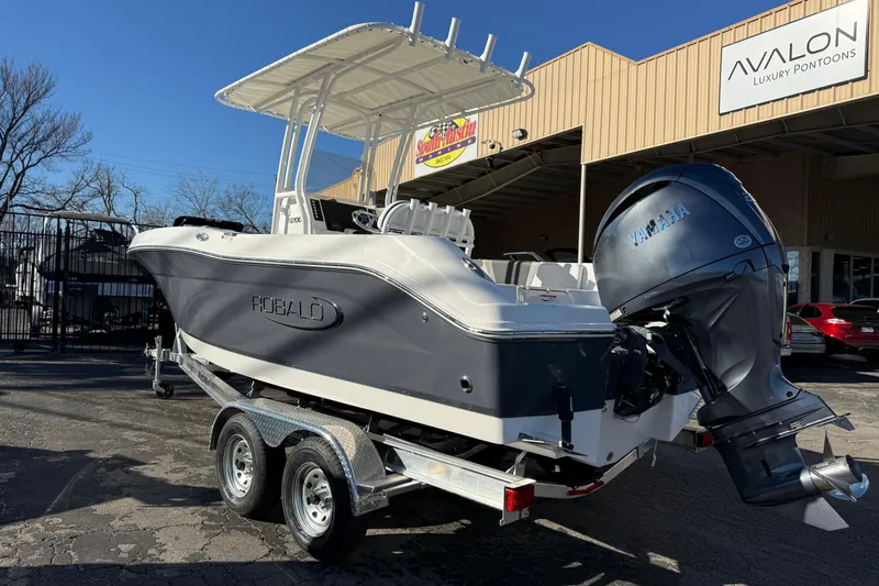 Slide: The Image of 2026 Robalo R200 Center Console boat with Yamaha engine on trailer. - 4