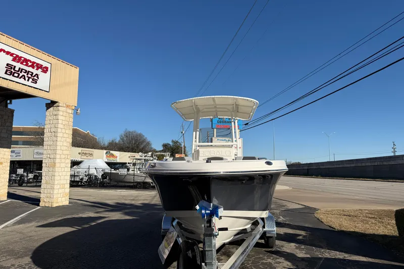 Slide: The Image of 2026 Robalo R200 Center Console boat on trailer at dealership. - 7