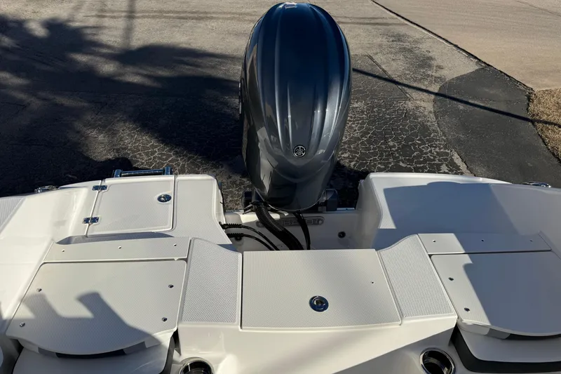 Slide: The Image of 2026 Robalo R200 Center Console boat with outboard motor, rear view. - 8