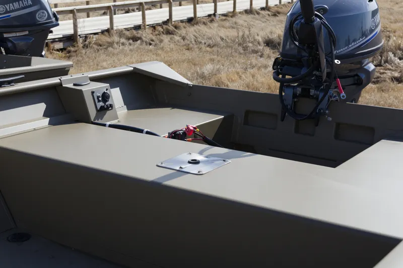 Slide: The Image of 2026 G3 Gator Tough 15 FL boat with Yamaha motor, outdoor setting. - 6