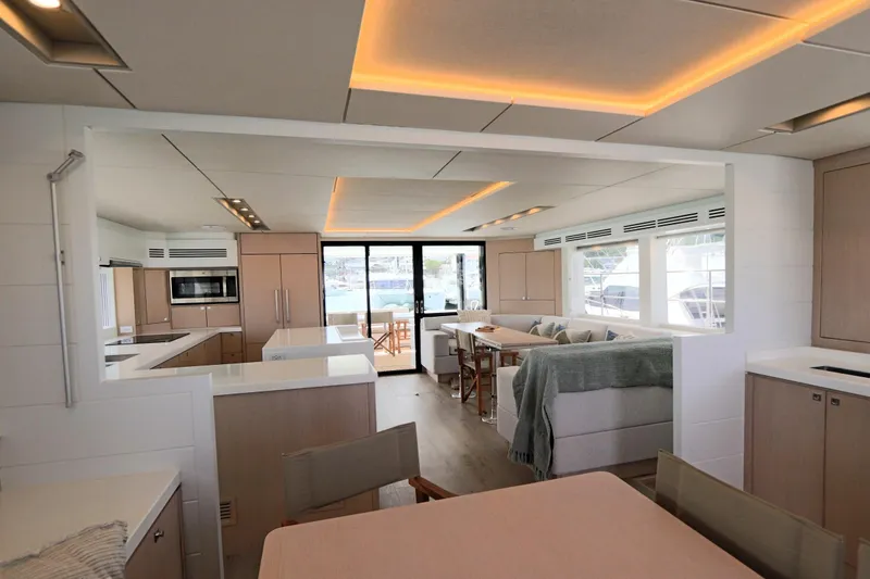Slide: The Image of Luxurious interior of 2025 Two Oceans 55 yacht with modern kitchen and seating area. - 12