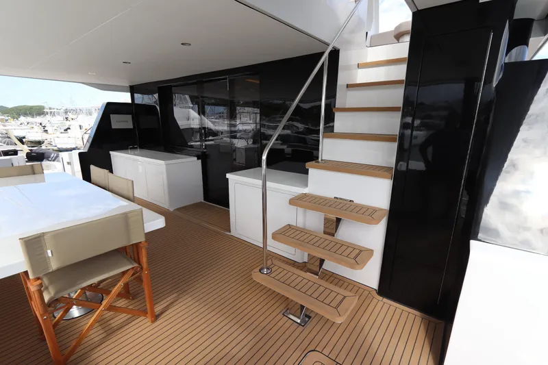 Slide: The Image of Luxurious deck of the Two Oceans 55 yacht, year 2025. - 2