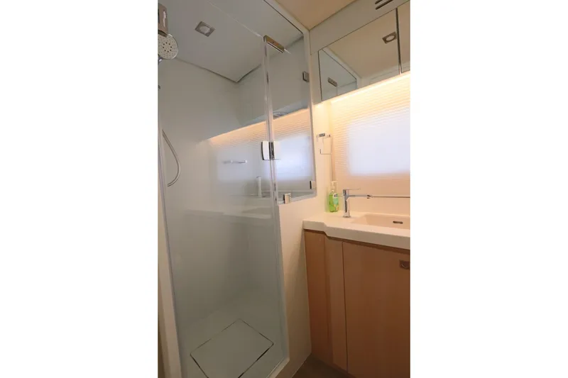 Slide: The Image of Modern bathroom interior on 2025 Two Oceans 55 yacht, featuring sleek shower and vanity. - 25