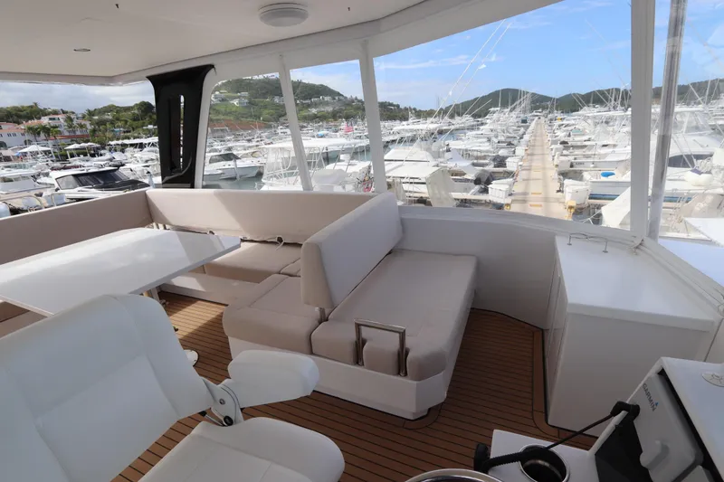 Slide: The Image of Luxurious interior of 2025 Two Oceans 55 yacht with marina view. - 41