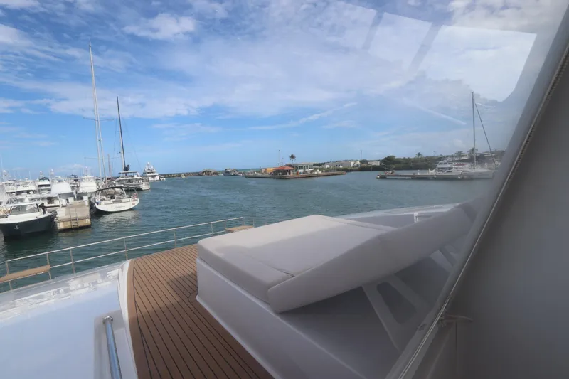 Slide: The Image of Luxurious Two Oceans 55 yacht docked at marina, 2025 model, with scenic ocean view. - 45