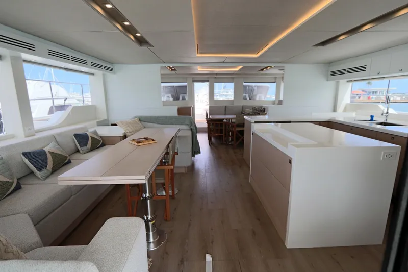 Slide: The Image of Luxurious interior of 2025 Two Oceans 55 yacht with modern furnishings and large windows. - 5