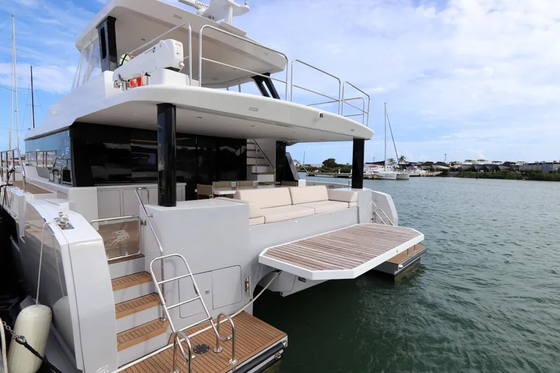 Slide: The Image of Luxurious 2025 Two Oceans 55 yacht docked, featuring spacious deck and modern design. - 53