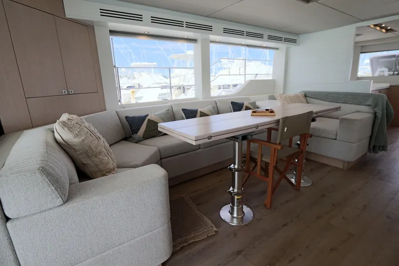 Slide: The Image of Luxurious interior of 2025 Two Oceans 55 yacht with modern seating and table. - 6