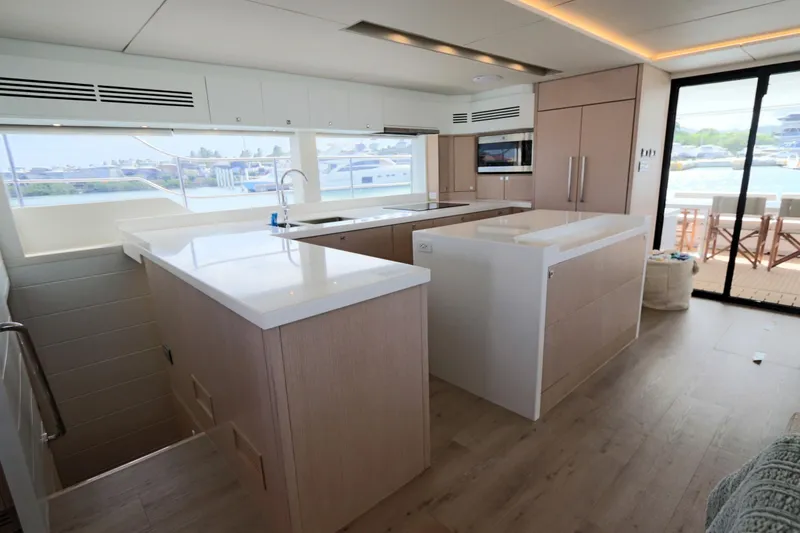 Slide: The Image of Luxurious interior of 2025 Two Oceans 55 yacht with modern kitchen design. - 8