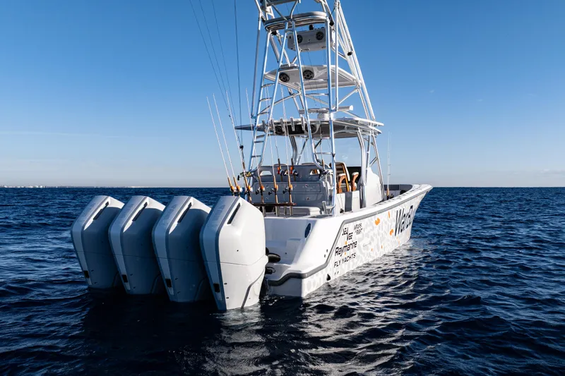 Slide: The Image of 2026 SeaVee 420Z boat with custom graphics on open water. - 10