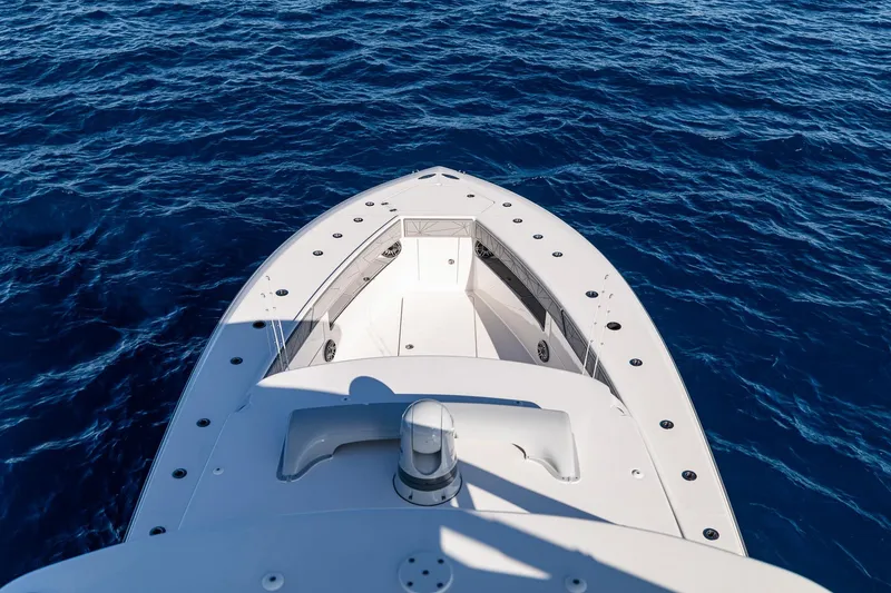 Slide: The Image of 2026 SeaVee 420Z boat on open ocean, aerial view. - 14