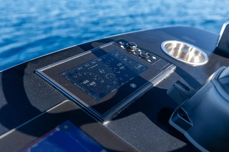 Slide: The Image of Control panel of 2026 SeaVee 420Z boat with ocean background. - 17
