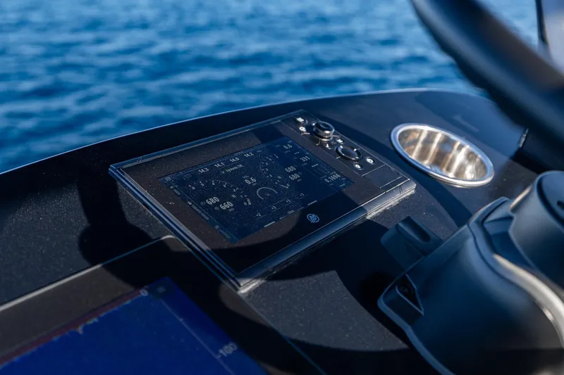 Slide: The Image of Throttle control on 2026 SeaVee 420Z boat, with ocean in background. - 18
