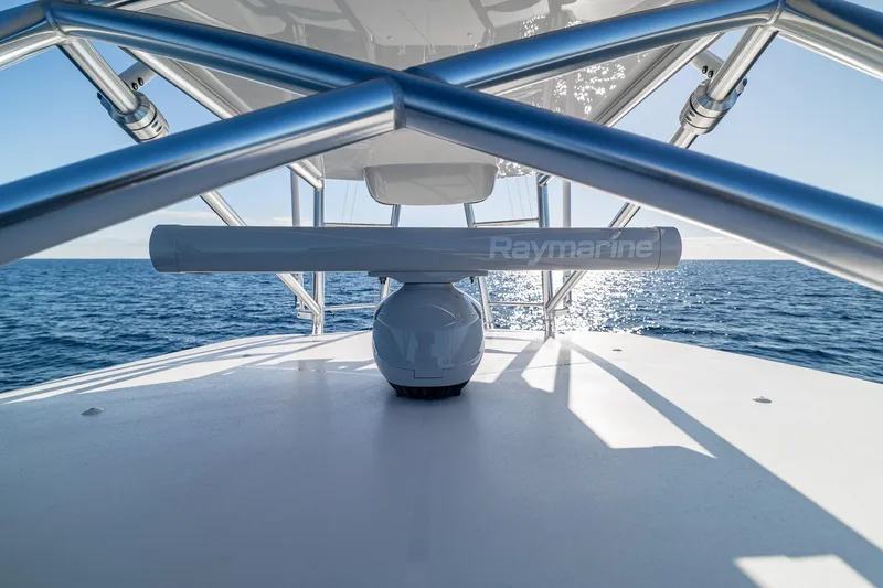 Slide: The Image of 2026 SeaVee 420Z boat with advanced lighting system on open sea. - 24