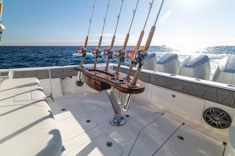 Slide: The Image of 2026 SeaVee 420Z fishing boat with multiple rods, ocean backdrop, and sleek design. - 35